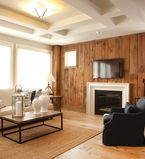 Light beige walls in a living room with a feature wall of cedar shiplap