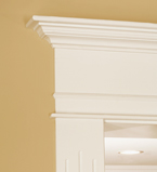 Close up of white casing with moulding around corner of doorway